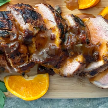 a few slices of grilled pork with chipotle sauce