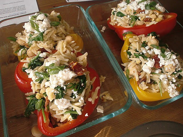 Orzo and feta stuffed peppers in pyrex.