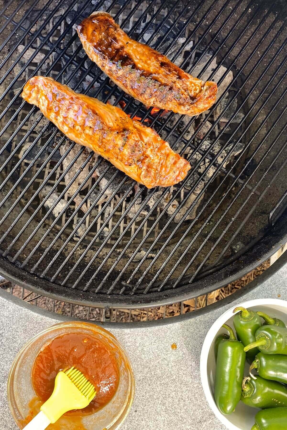 pork tenderloin on a gril.