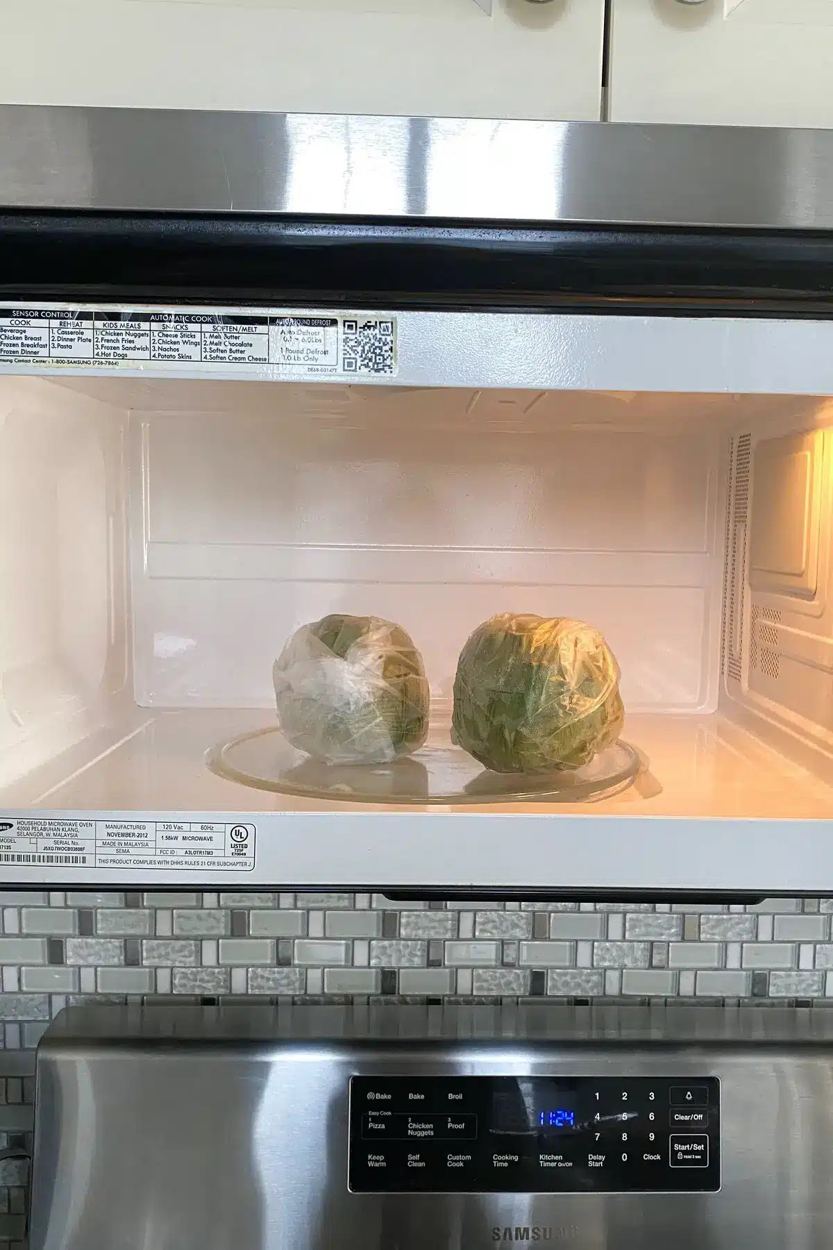 2 artichokes in the microwave.