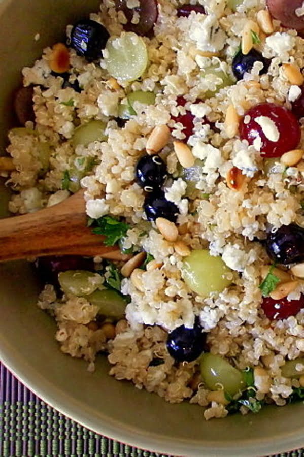 A cool, refreshing and delicious fruit quinoa salad with grapes, blueberries, pine nuts and an apple cider vinaigrette will be a welcome addition to any menu. #quinoa #quinoasalad #fruitquinoa #healthyrecipe #blueberries #healthysidedishrecipe