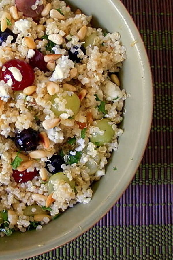 A cool, refreshing and nutritious fruit quinoa salad with grapes, blueberries, pine nuts and an apple cider vinaigrette will be a welcome addition to any menu. #quinoa #quinoasalad #fruitquinoa #healthyrecipe #blueberries #healthysidedishrecipe