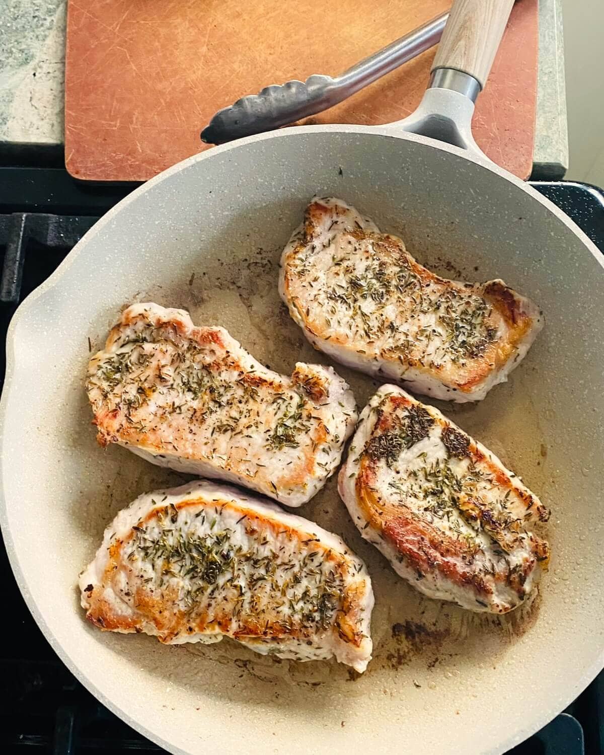 pan frying pork chops.
