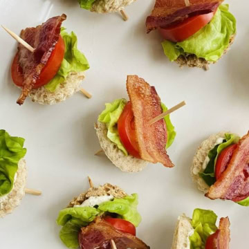 appetizer blt skewers on a shite plate