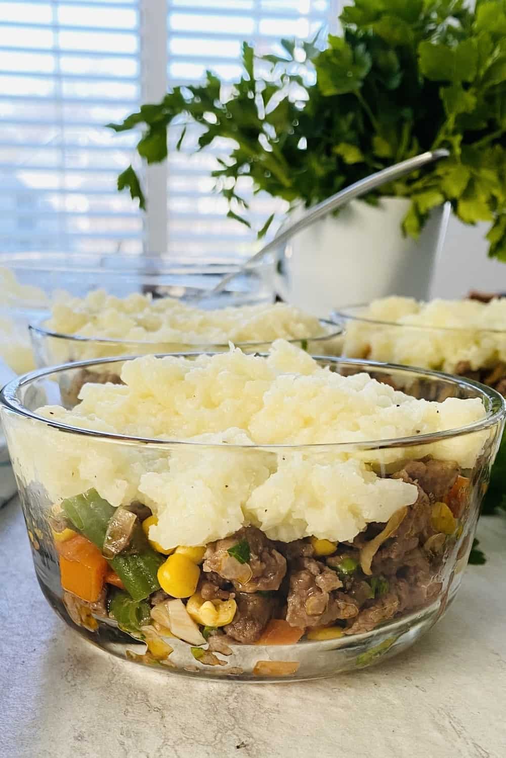 Single serving ground turkey shepherd's pie with cauliflower mash topping.