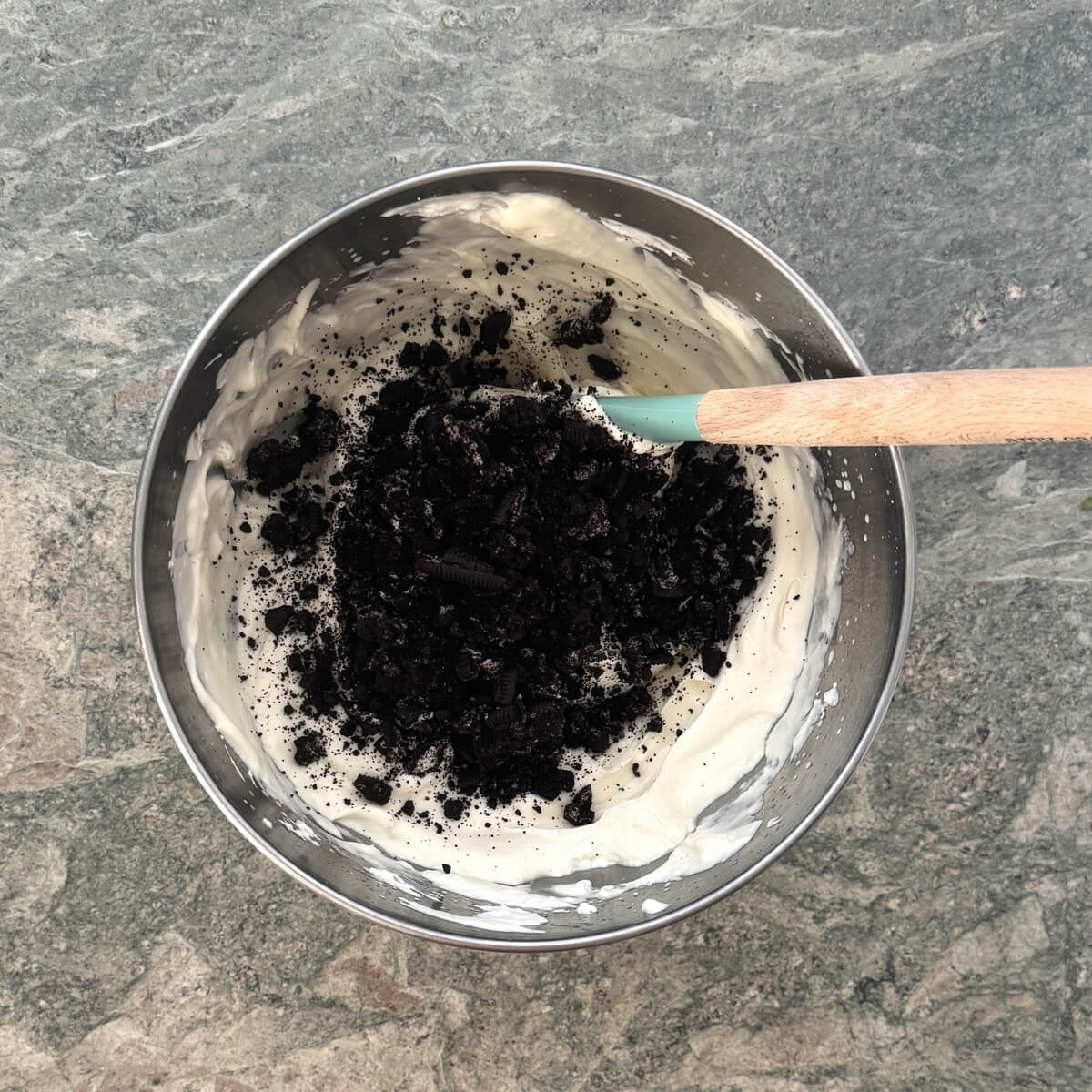 Crushed cookies with ice cream mixture.