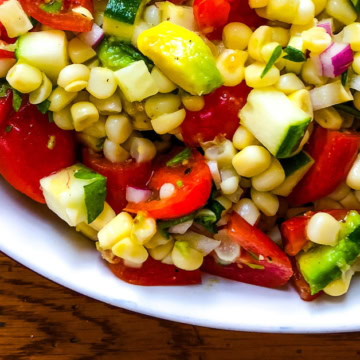 summer salad with corn and avocado and a sherry vinaigrette