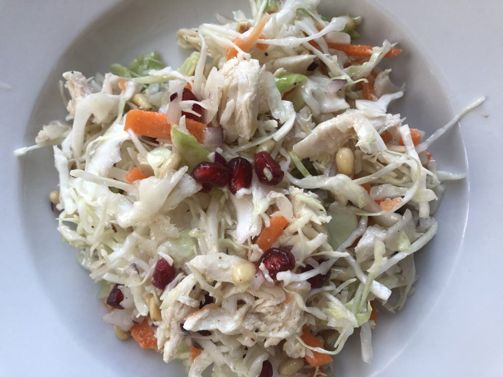 Bowl with chicken coleslaw.