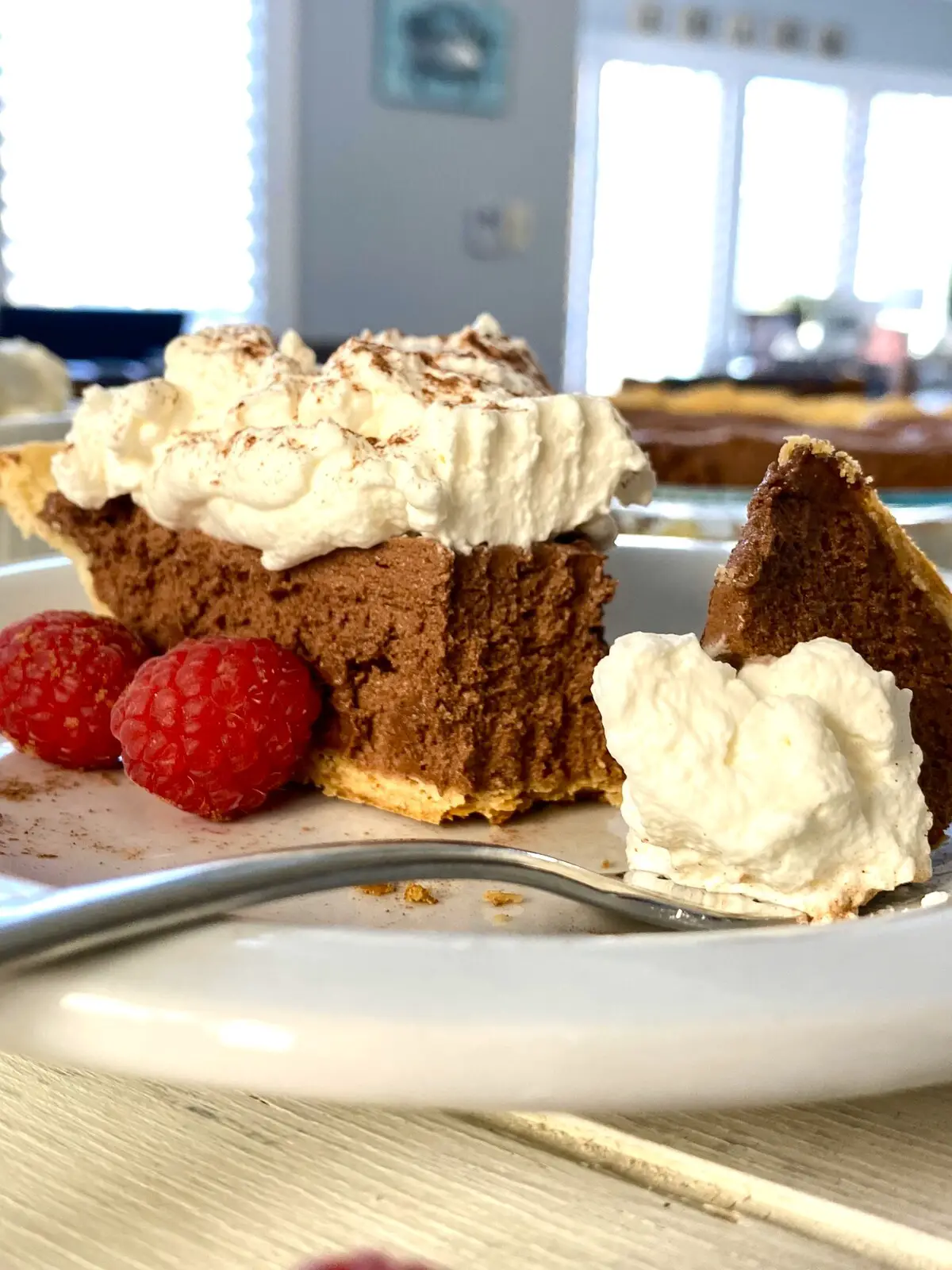 slice of French silk pie with forkful.