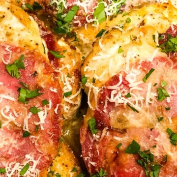chicken topped with capicola in a white wine sauce.