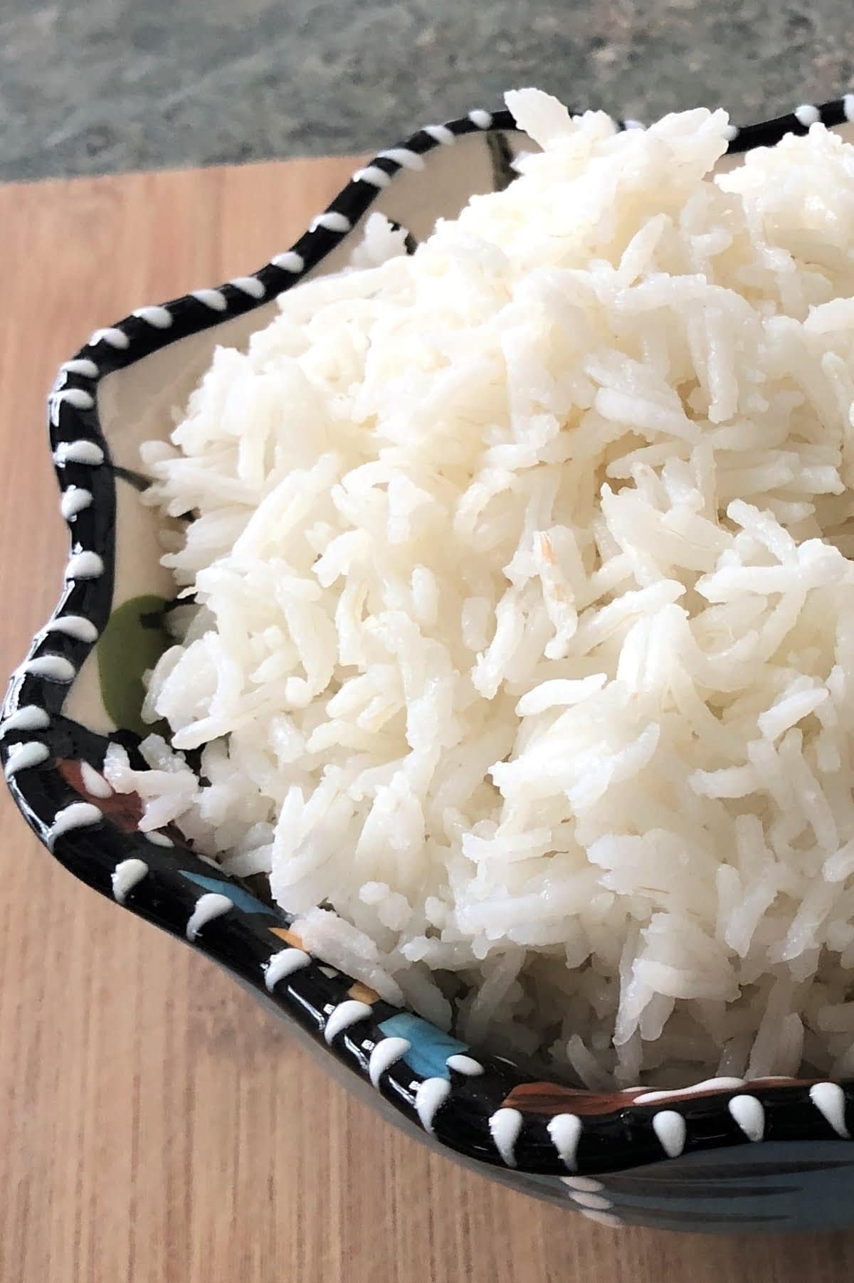 cooked fluffy white rice in a bowl.