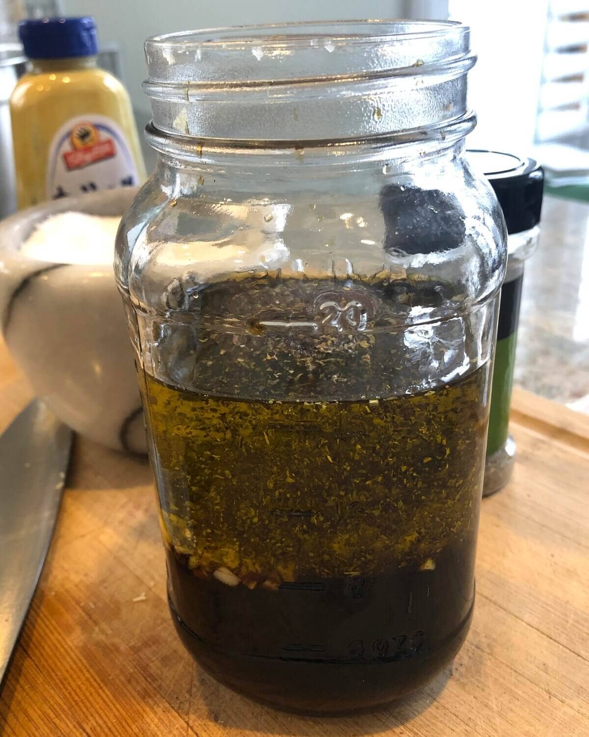 A balsamic marinade/vinaigrette in a mason jar.