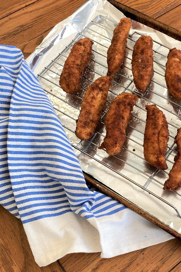 baking rack with chicken tenders.