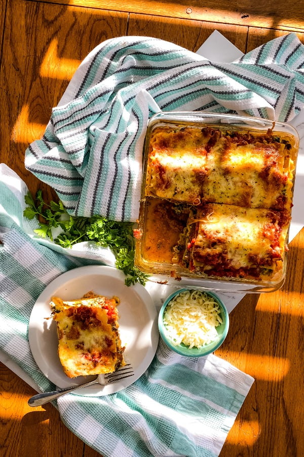 baked lasagna with 1 piece removed
