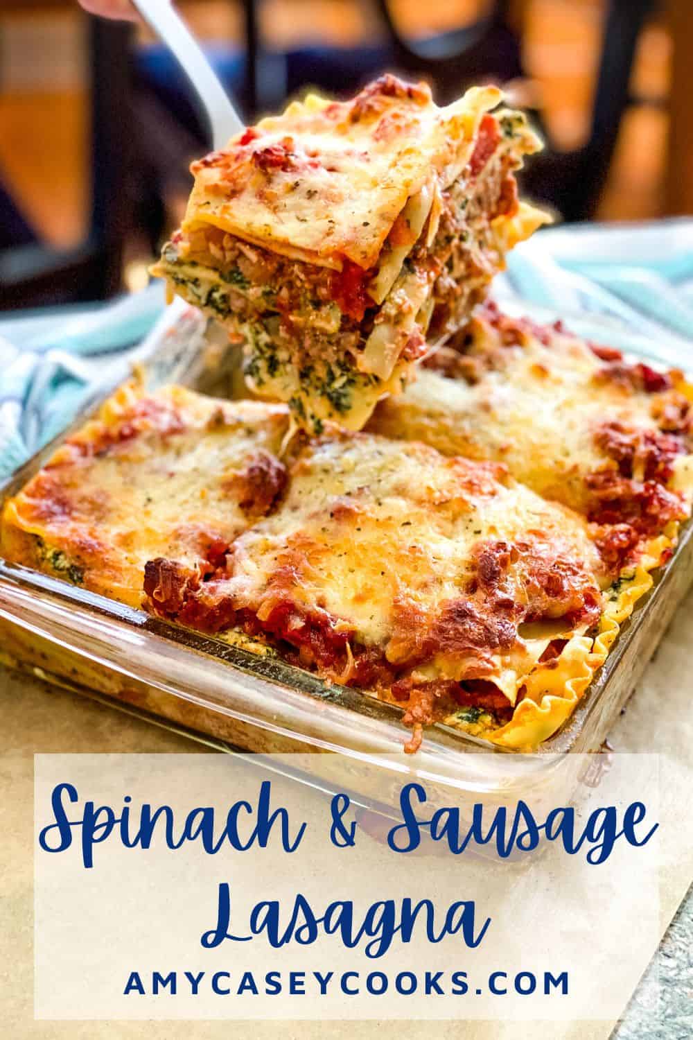 slice of cheesy, spinach and sausage lasagna