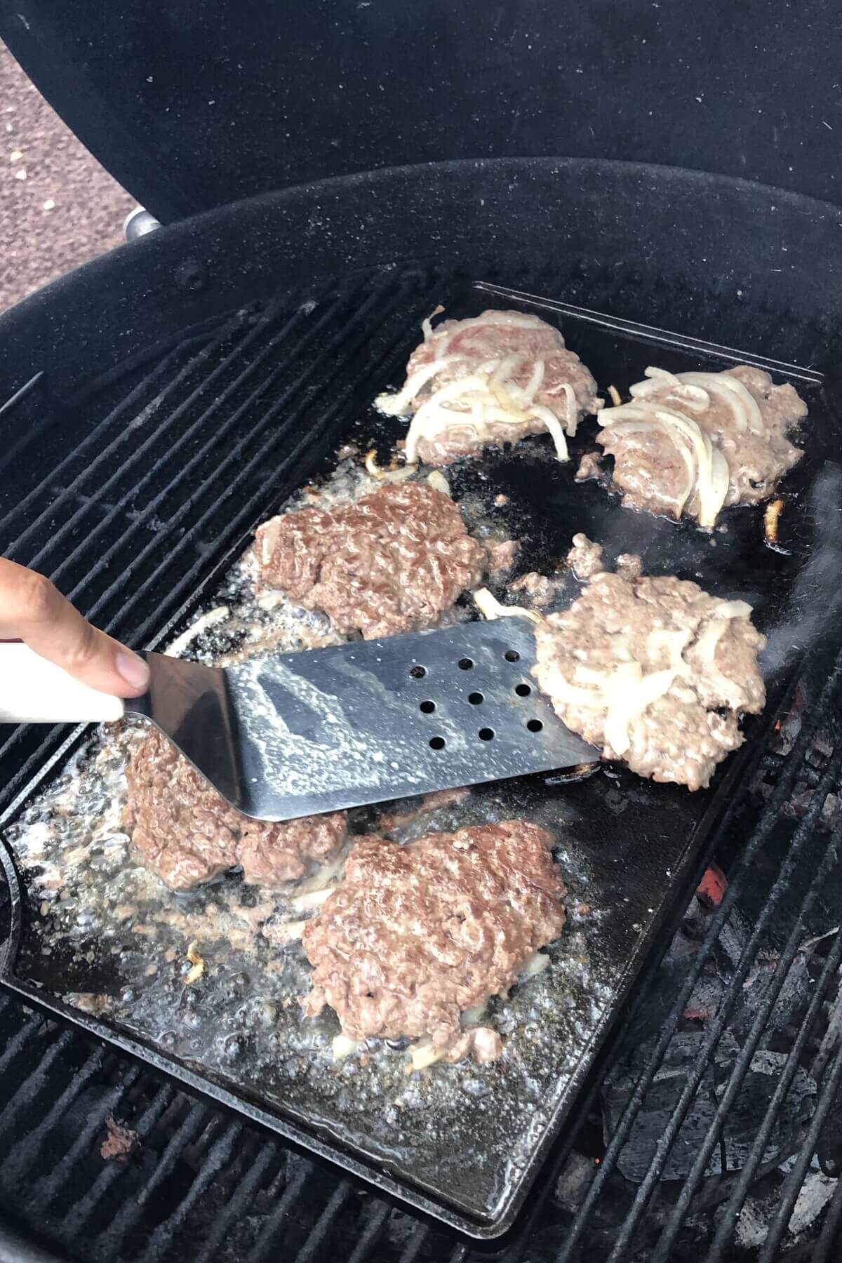 flipping smash burgers.