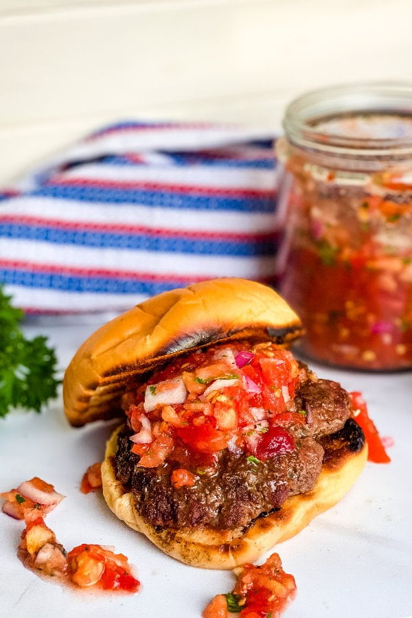 burgers on a bun with tomato relish