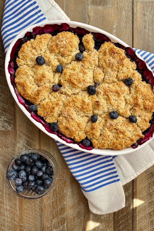 a fruit dessert with a cake like topping