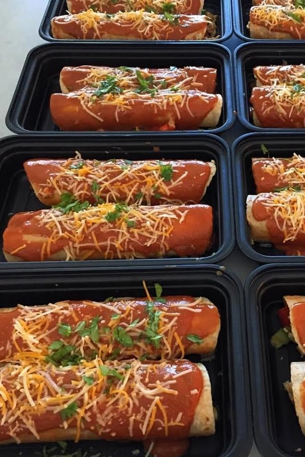 Ground beef enchiladas in meal prep containers.