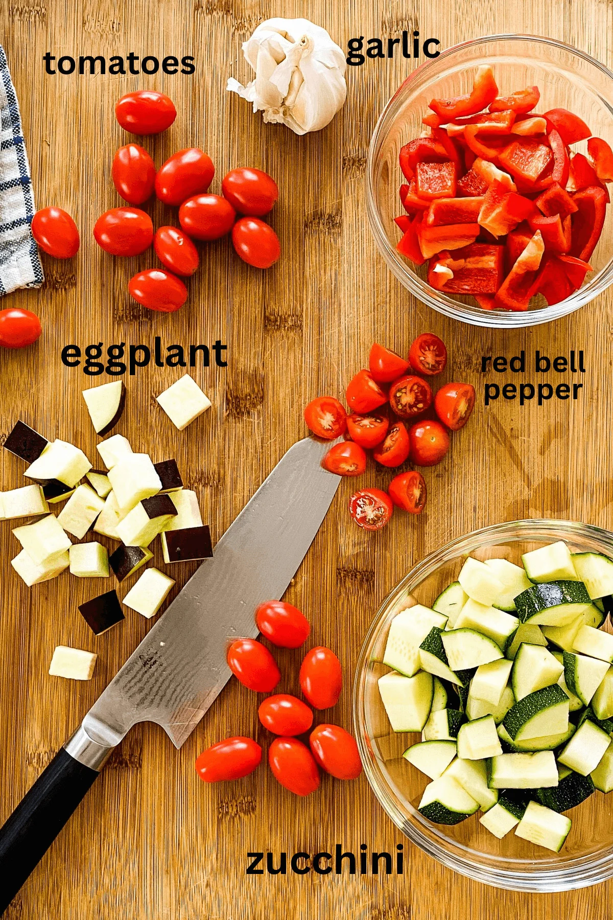 Large diced eggplant, tomatoes, re peppers, and garlic.