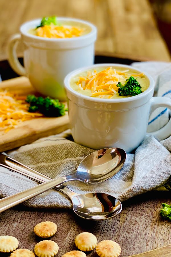 fresh creamy vegetable soup served in mugs