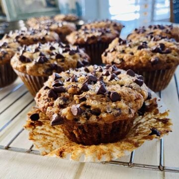 One dairy free banana muffin with wrapper removed.