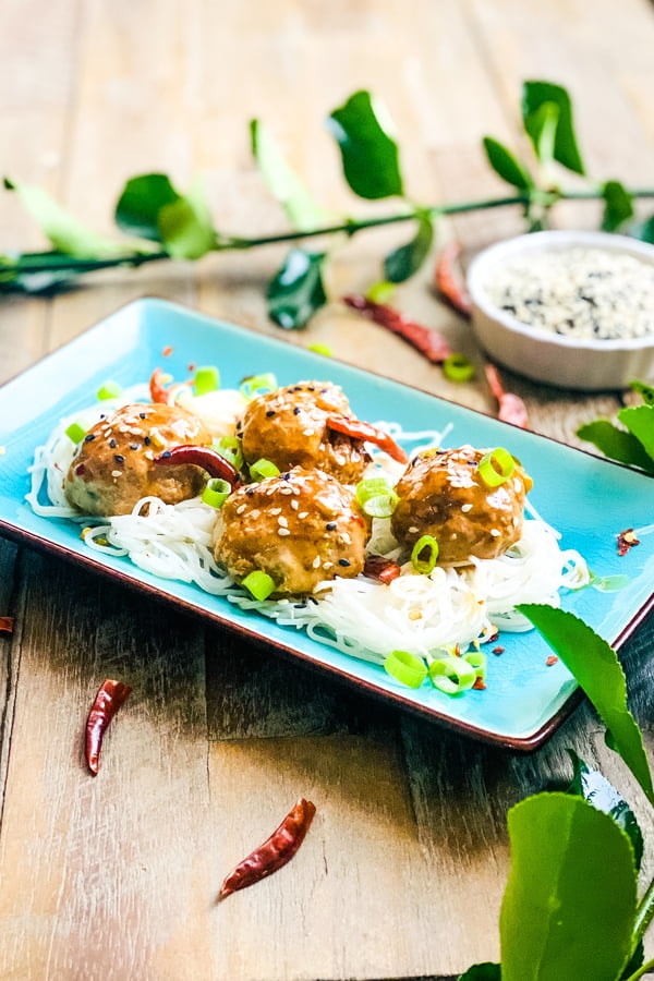 spicy meatballs served over rice noodles
