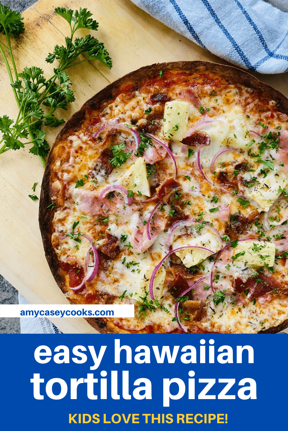 a pizza made on a tortilla with ham, bacon and pineapple.