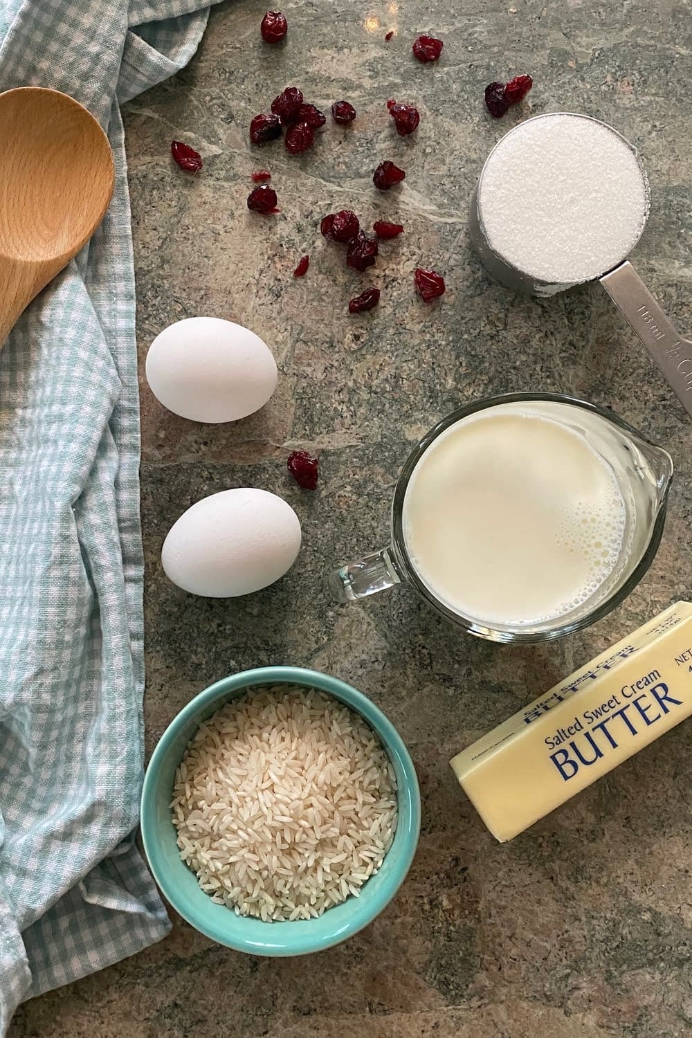 grain, whole milk, butter, eggs, sugar and dried cranberries for creamy dessert