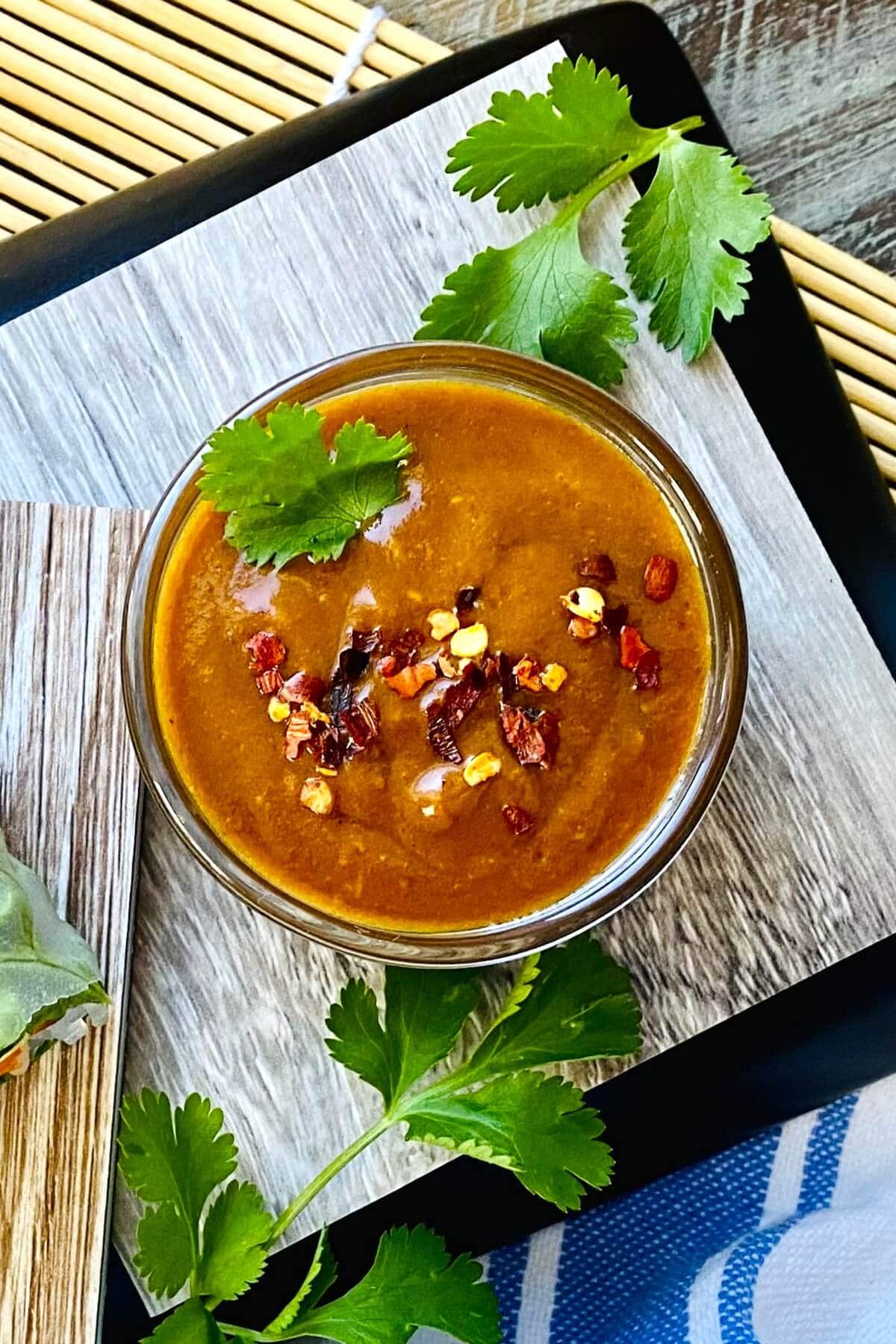 A bowl of peanut dipping sauce.