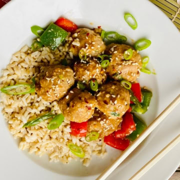 bowl of teriyaki turkey meatballs with brown rice