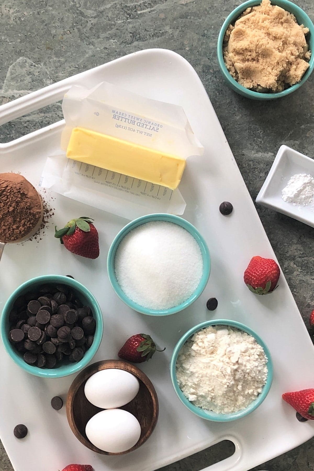 butter, chocolate chips, cocoa powder, sugar, flour, brown sugar