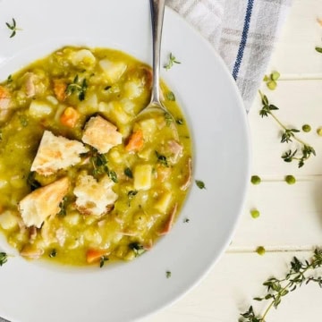bowl of split pea soup with ham.