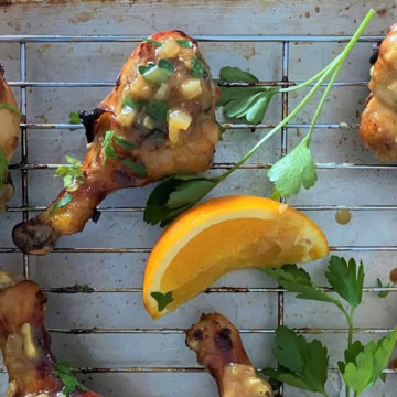 oven roasted chicken legs on a baking rack
