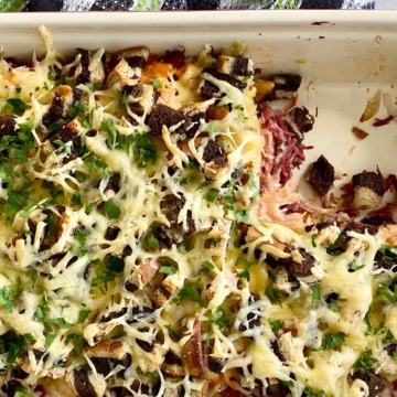 reuben casserole with 1 slice cut out.