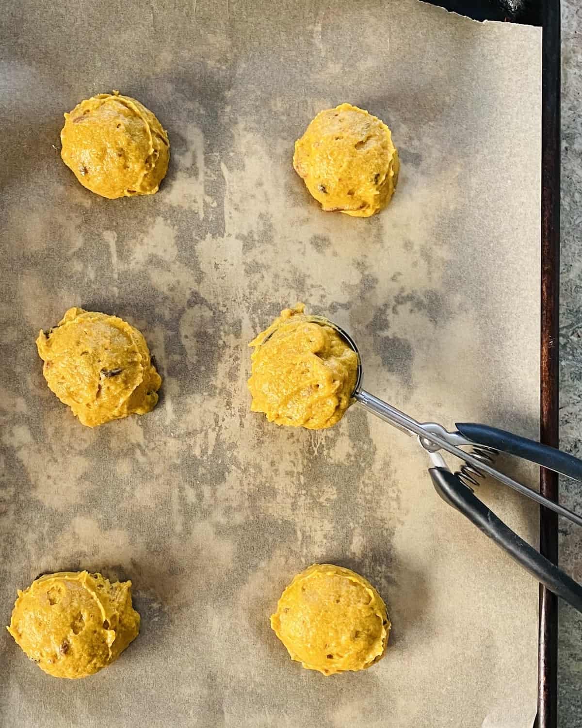 scooping cookie dough