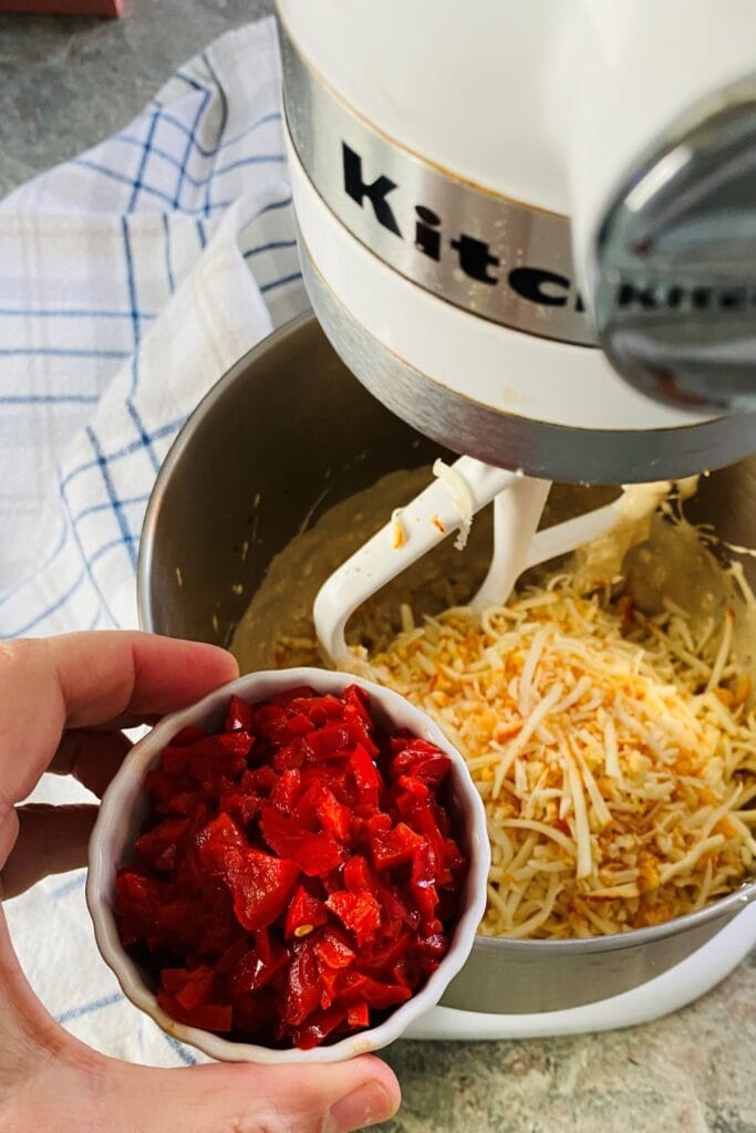 adding peppadew peppers to mixer