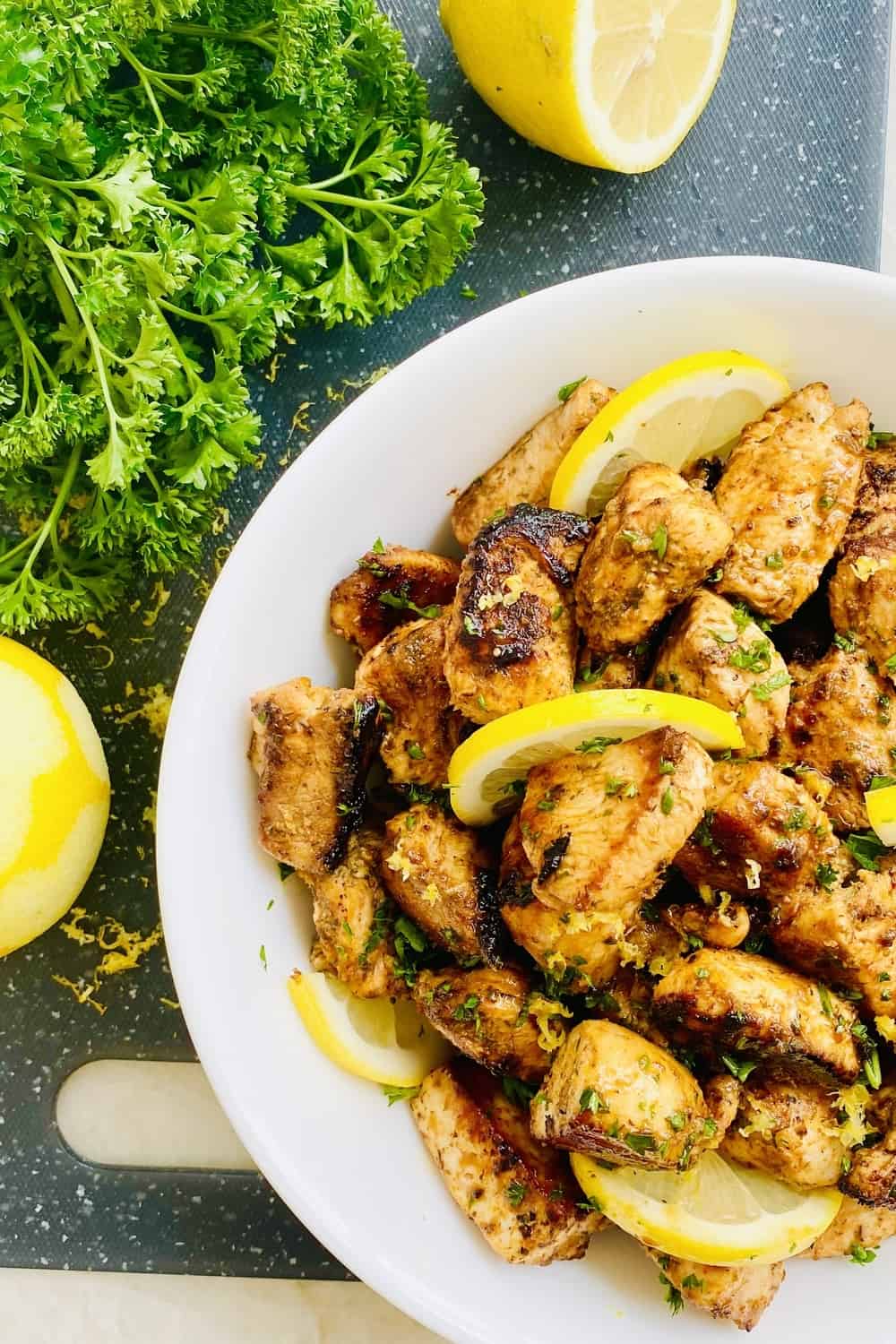 sauteed lemon herb chicken with lemons and parsley