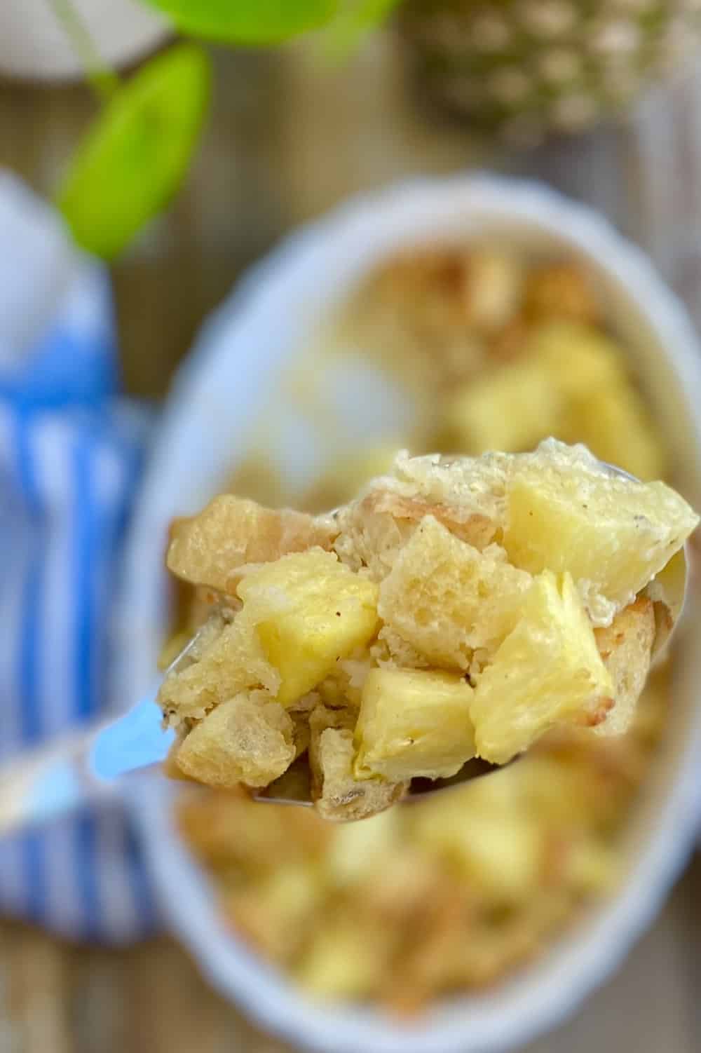 spoon of fresh pineapple bread pudding