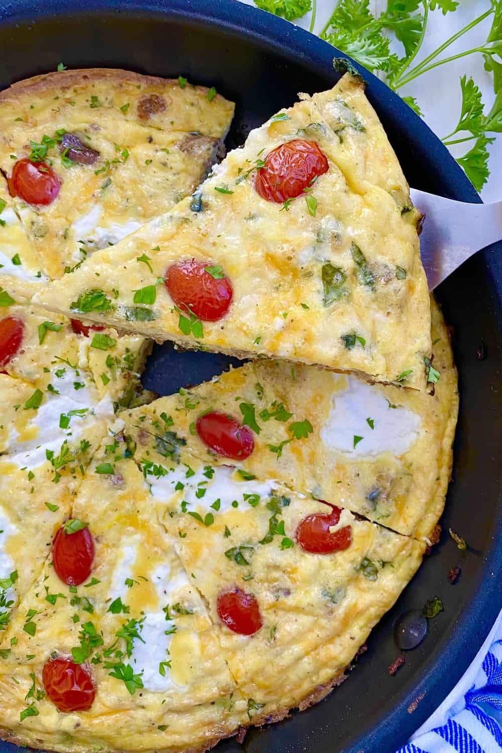 slice of baked frittata from sauté pan