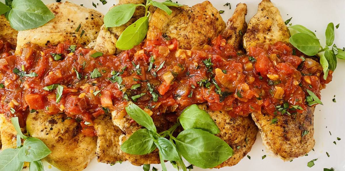 Butter Sauteed Chicken Breast with Fresh Tomato, Wine and Basil Sauce