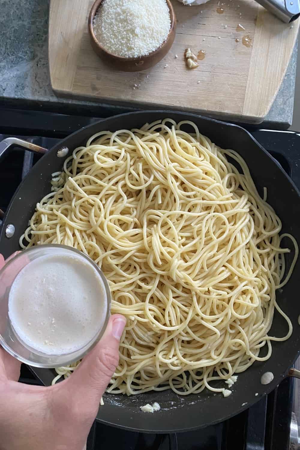 adding heavy cream to noodles