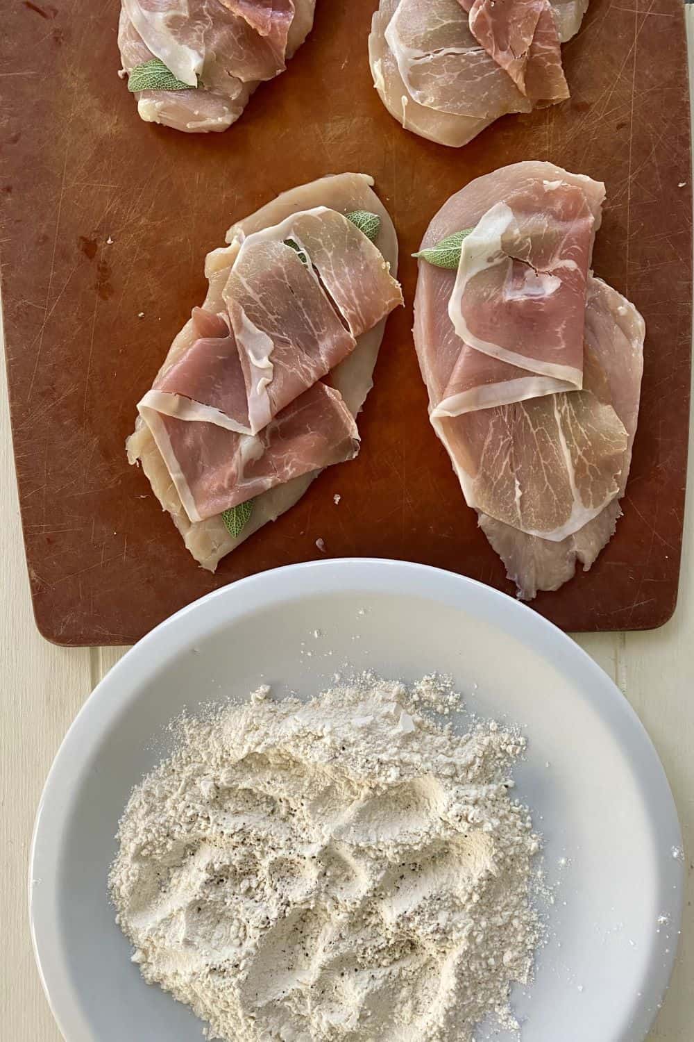 Thin chicken cutlets topped with sage and prosciutto.