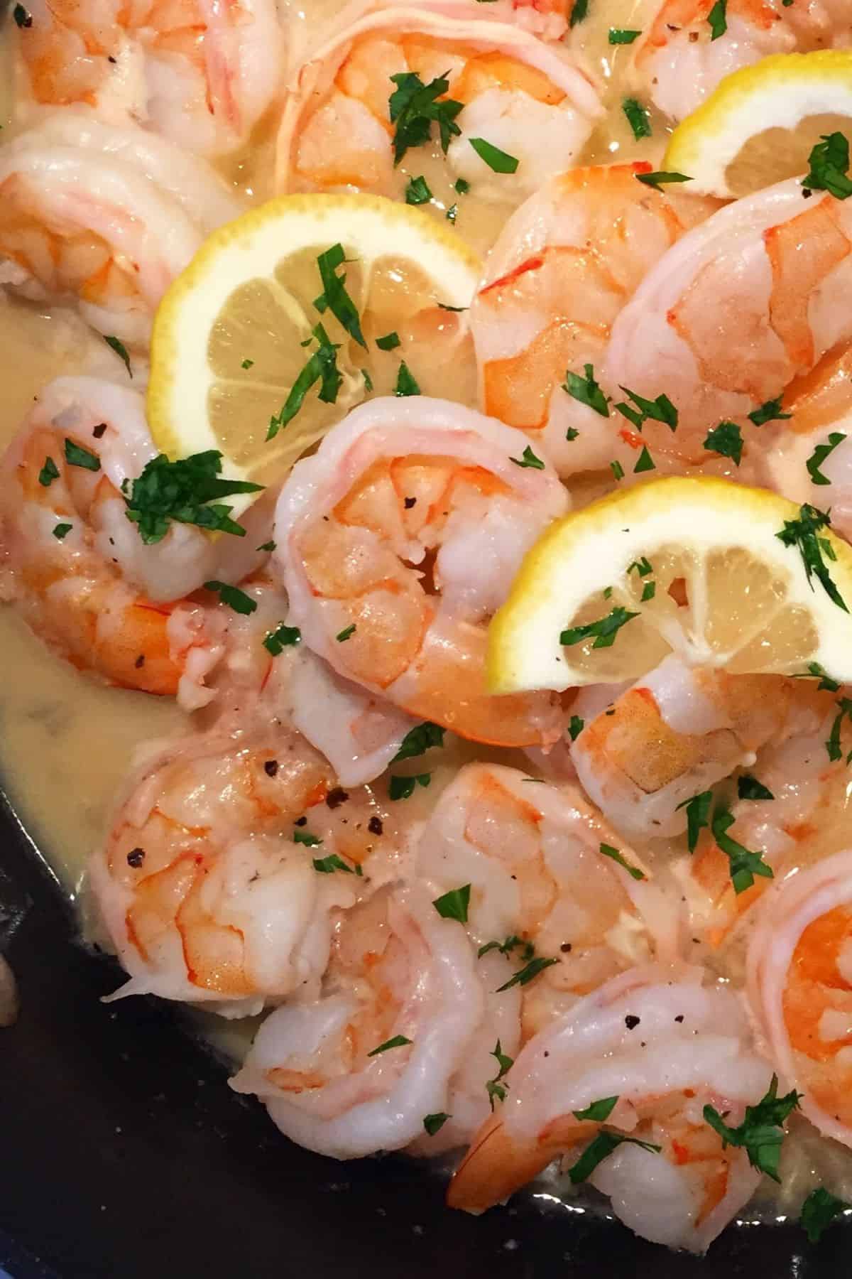 shrimp in a garlic butter and lemon wine sauce.