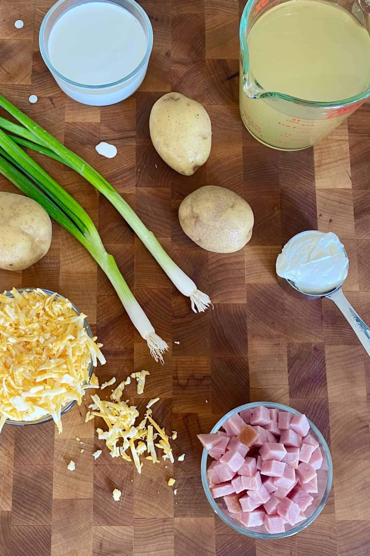 ham, potatoes, colby jack cheese, scallions, chicken stock, sour cream, heavy cream.