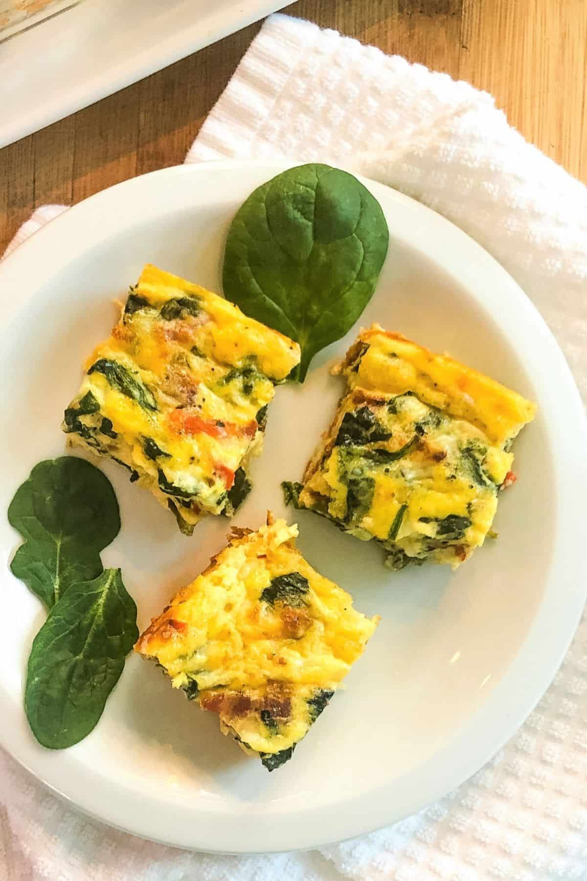 3 squares of crustless spinach quiche recipe.