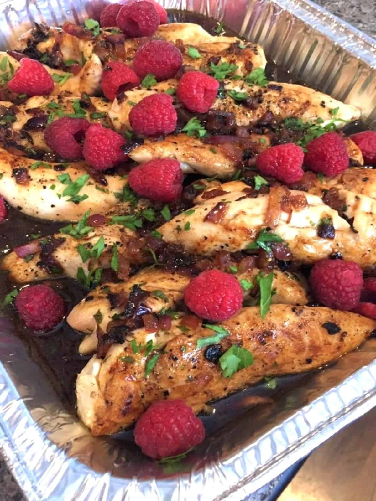 foil pan of raspberry balsamic chicken.