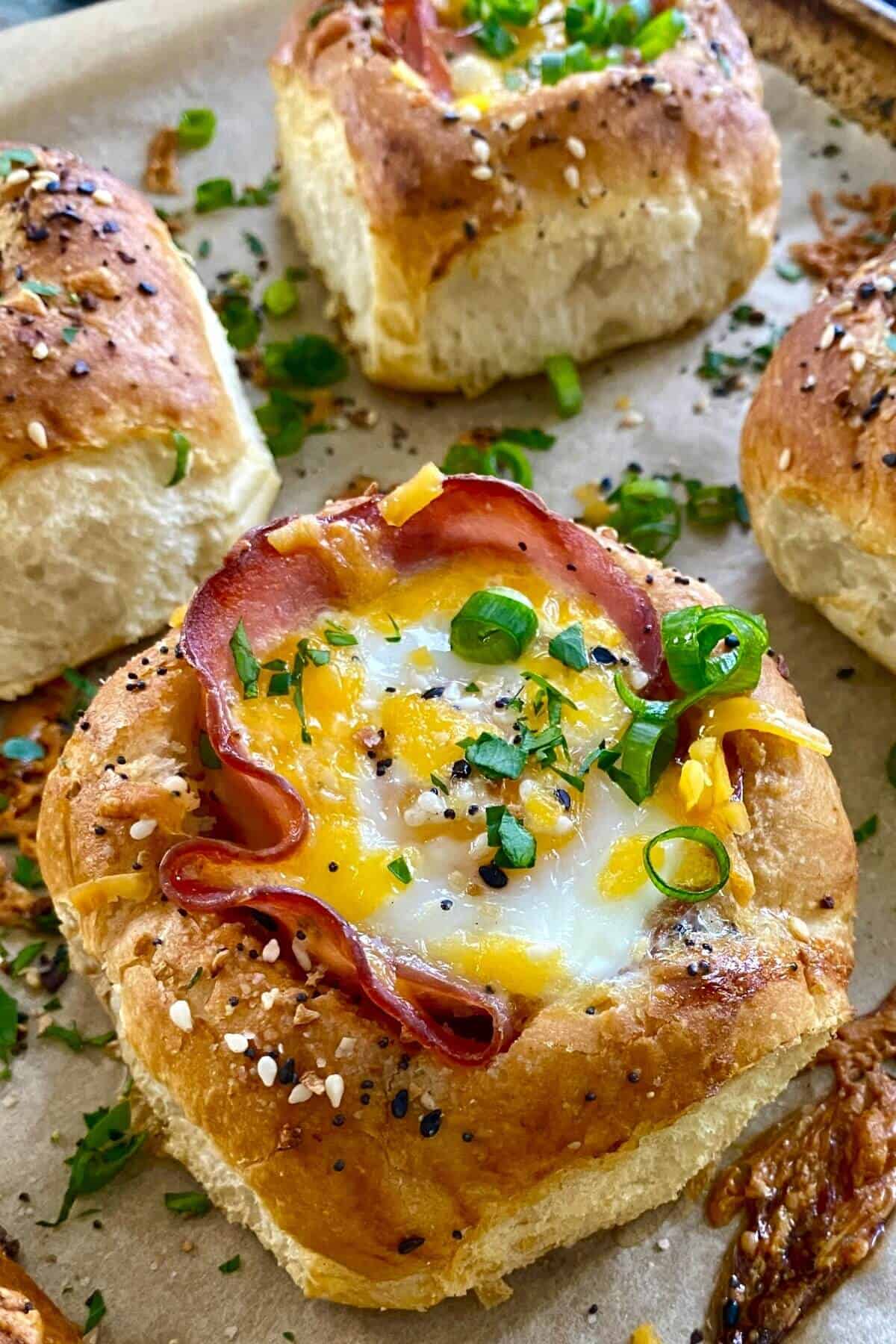 a ham and egg sandwich in a bread bowl.
