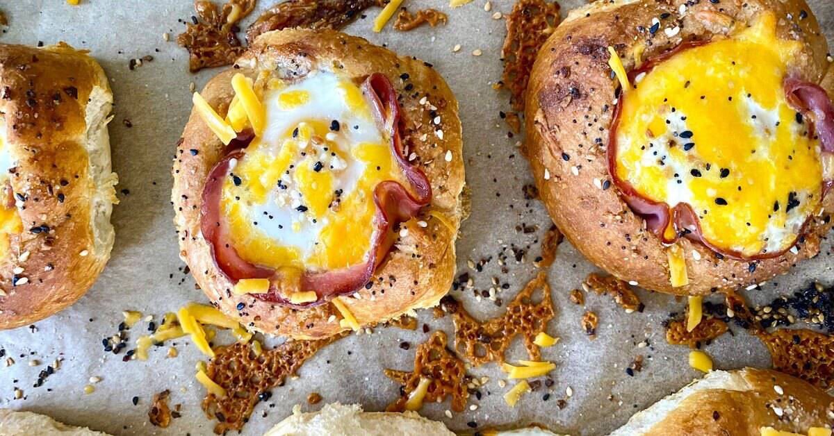 bread bowls with ham and egg sandwiches.