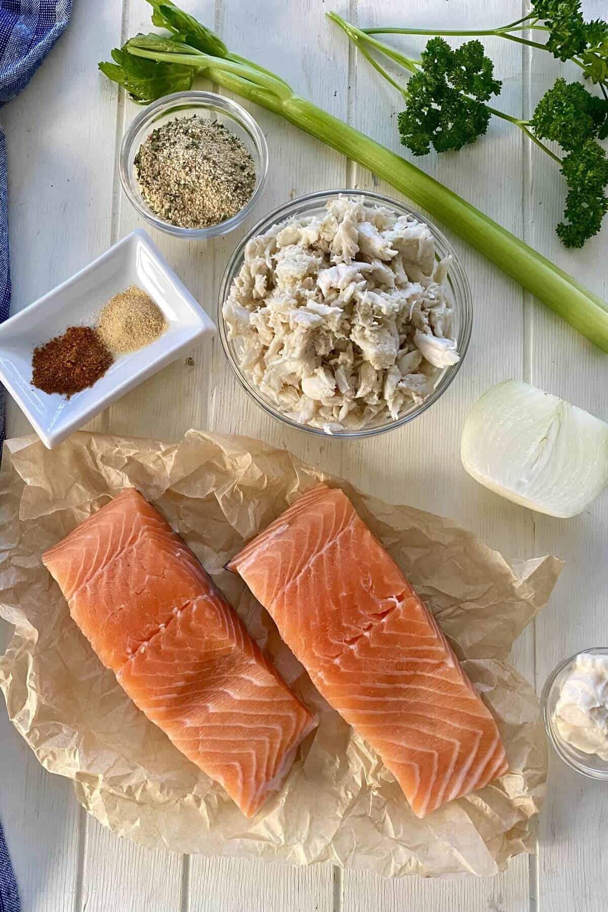 salmon, mayonnaise, breadcrumbs, celery, onion, Old Bay seasoning.